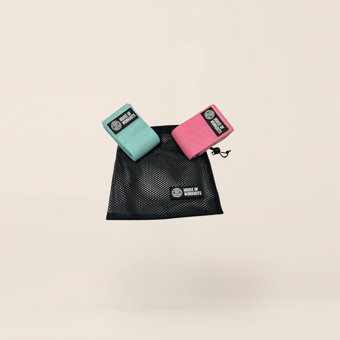 Voordeelset Booty Bands met 2 sterktes in mint en roze, met draagzak