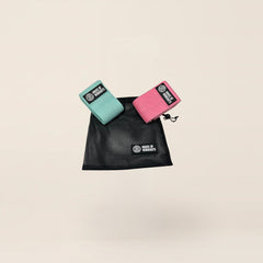 Voordeelset Booty Bands met 2 sterktes in mint en roze, met draagzak